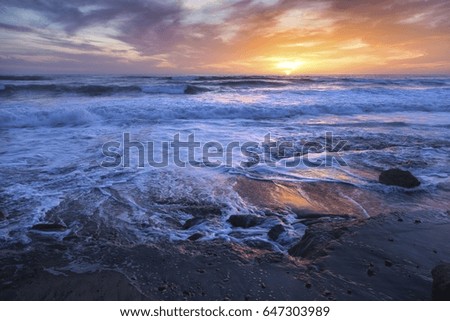 Dramatic Sunset Sky and Distant Pacific Ocean Landscape at Torrey Pines State Beach near La Jolla Shores north of San Diego California USA
