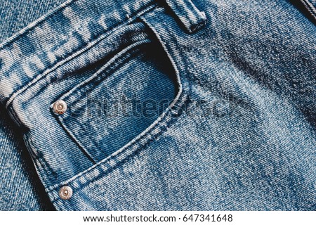 Jeans background, denim with seam of fashion design Royalty-Free Stock Photo #647341648