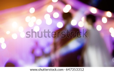 abstract blur groom and bride go to stage in wedding ceremony