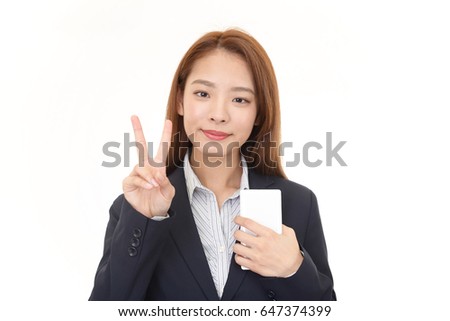 Asian business woman with a smart phone