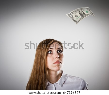 Woman in white and falling one dollar. 
