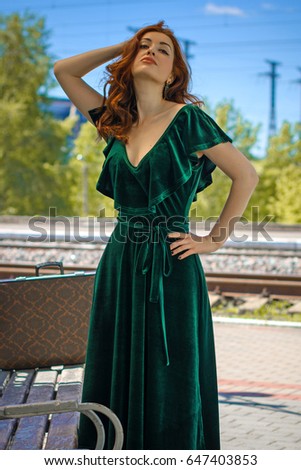 Beautiful american woman in velvet vintage dress in old cinema style look