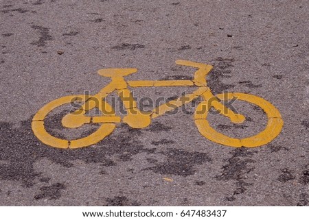 Road marking on asphalt in the form of a bicycle. Bike lane.