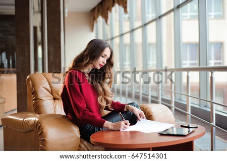 Breaktime business. Close up of cute young girl working on laptop while waiting for her flight in an Aeroport