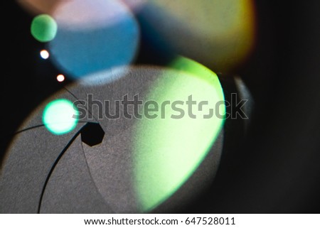 flare lens camera background macro light flash real bright film focus performance dust black optical color glowing concept - stock image