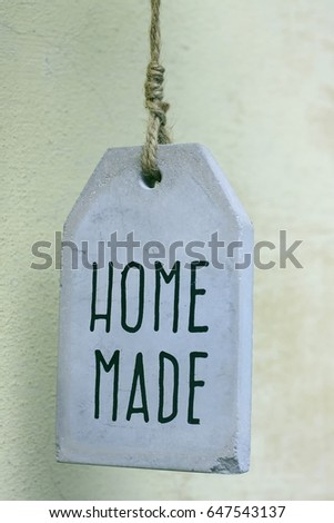 White ceramic sign with Home Made inscription