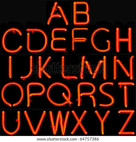 Real neon sign capital letter alphabet black background
