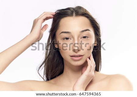 Well-groomed woman on isolated background                              