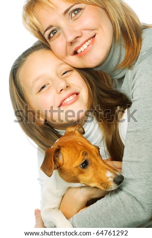Young mother and her daughter with Jack Russell Terrier. over white background