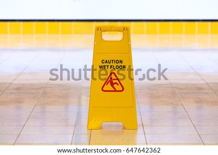 Wet floor yellow caution sign