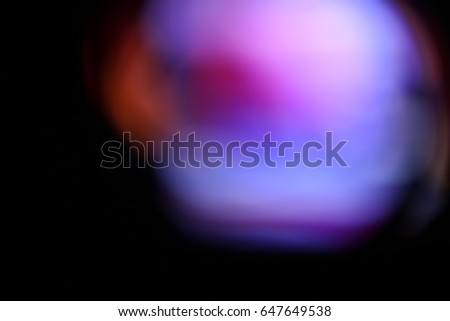 Abstract background - light color flashes and rays on black. Lens flare. For use as texture layer in your project. Add as "Lighten" Layer in Photo editor to add color flashes any image.