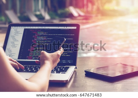 A Piece of programming code in IDE with blur effect. Programmer developer screen. Website codes on computer monitor. Source code close-up. Notebook closeup photo.