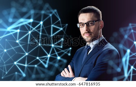 business, people and technology concept - businessman in glasses over black background with low poly shape projection