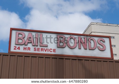 Bail Bonds sign on top of building Royalty-Free Stock Photo #647880280