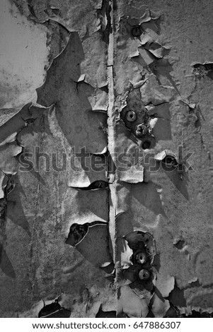 Peeling paint rusting metal rough texture. Image includes a effect the black and white tones.