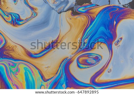 Abstract colorful oil on water background Royalty-Free Stock Photo #647892895