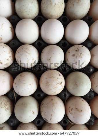 Eggs on plastic box