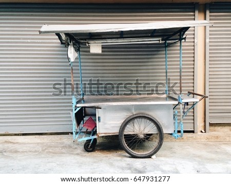 a trolley stop before go to work in evening at Bangkok street food Royalty-Free Stock Photo #647931277