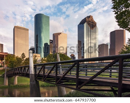 Houston Skyline over a pedestrian bridge that crosses Buffalo Bayou