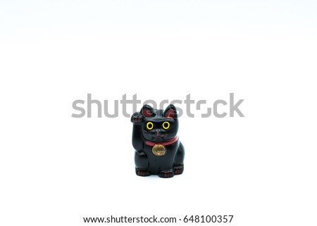 Black lucky cat with white background.