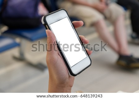 Left hand using white smartphone.