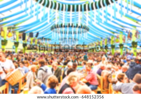 Blur_People enjoy live music and drinking beer during October festival in munich (München), Germany Royalty-Free Stock Photo #648152356