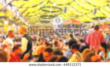 Blur_People enjoy live music and drinking beer during October festival in munich (München), Germany Royalty-Free Stock Photo #648152371