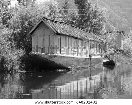 Houseboat on Dal Lake in Srinagar - India - black and white photography