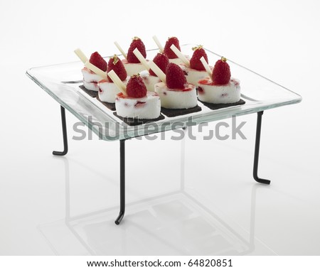 Glass tray with desserts