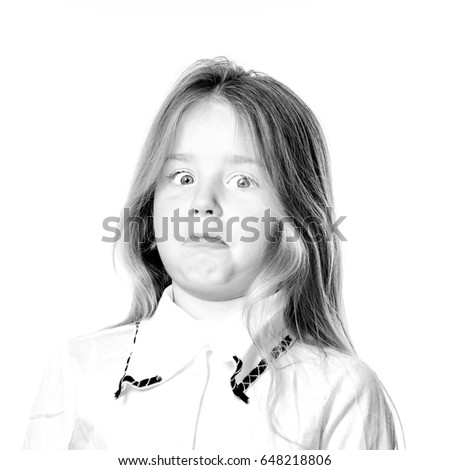 Cute little girl posing for advertising, making signes by hands and face expressions, isolated on white background