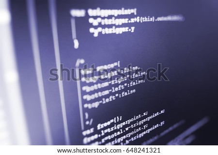 Source code close-up. WWW software development. Developer working on websites codes in office. Notebook closeup photo. Modern tech. Computer script typing work.  Mobile app developer. 
