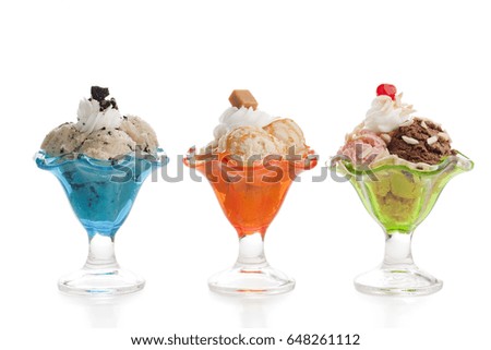 Delicious and creamy ice cream sundae; isolated on a white background