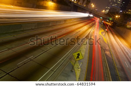 A long exposure of a freeway at night in the city.