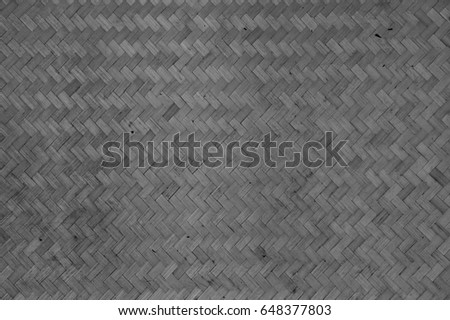 black and white background of old bamboo weaving wall