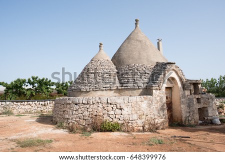 Trullo, Puglia. Italy. Stone houses. Murgia. Details of the land and the walls.