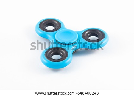 
Blue Fidget Spinner in white isolated background for stress release during work