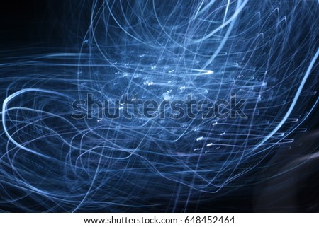 long exposure light streaks on dark background