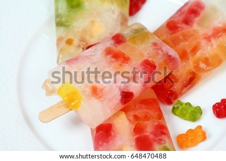 Homemade ice lolly from gummy bears. Jelly candies and funny popsicle  for children