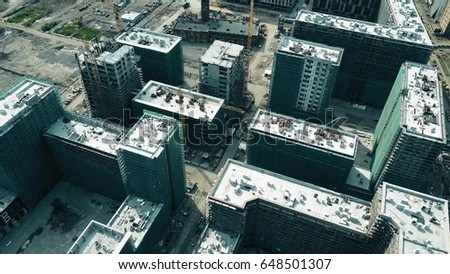 Aerial shot of modern apartment buildings construction site