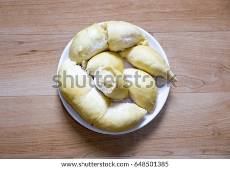 Thai fruit Durian in dish on  wooden background