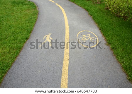 The sidewalk and bike path. 