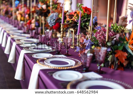 Table set for wedding or another catered event dinner. Royalty-Free Stock Photo #648562984
