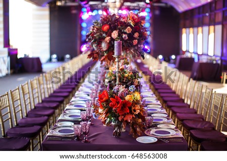 Table set for wedding or another catered event dinner. Royalty-Free Stock Photo #648563008