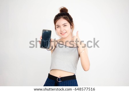 Portrait of thai adult beautiful girl show her smart phone