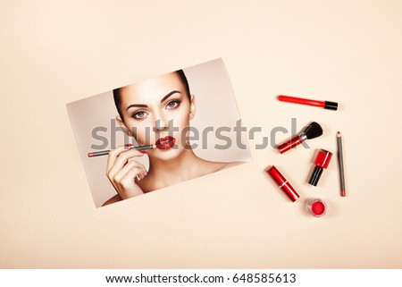 Fashion lady accessories collage. Falt Lay. Beauty photography. Make-Up brushes. Jewelry and nail polish. Beautiful woman paints lips with red lipstick. Nails and manicure