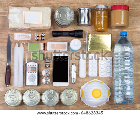  Objects useful in emergency situations such as natural disasters. Top view. Royalty-Free Stock Photo #648628345