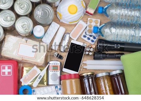  Objects useful in emergency situations such as natural disasters. Top view. Royalty-Free Stock Photo #648628354
