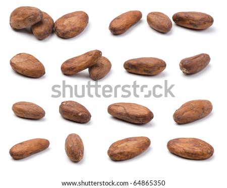 A variety of cocoa beans isolated on white backgrounds. Shallow depth of field. Royalty-Free Stock Photo #64865350