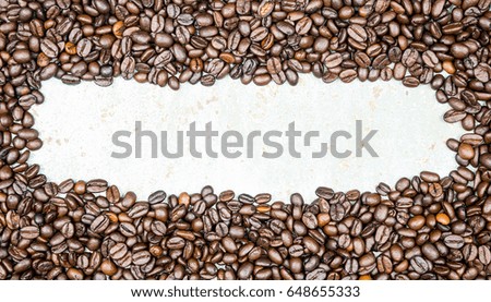 Coffee beans on wood background
