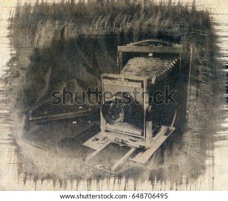 An old analogue camera in large format. Attention! The image contains the texture of the watercolor paper on which it is printed.